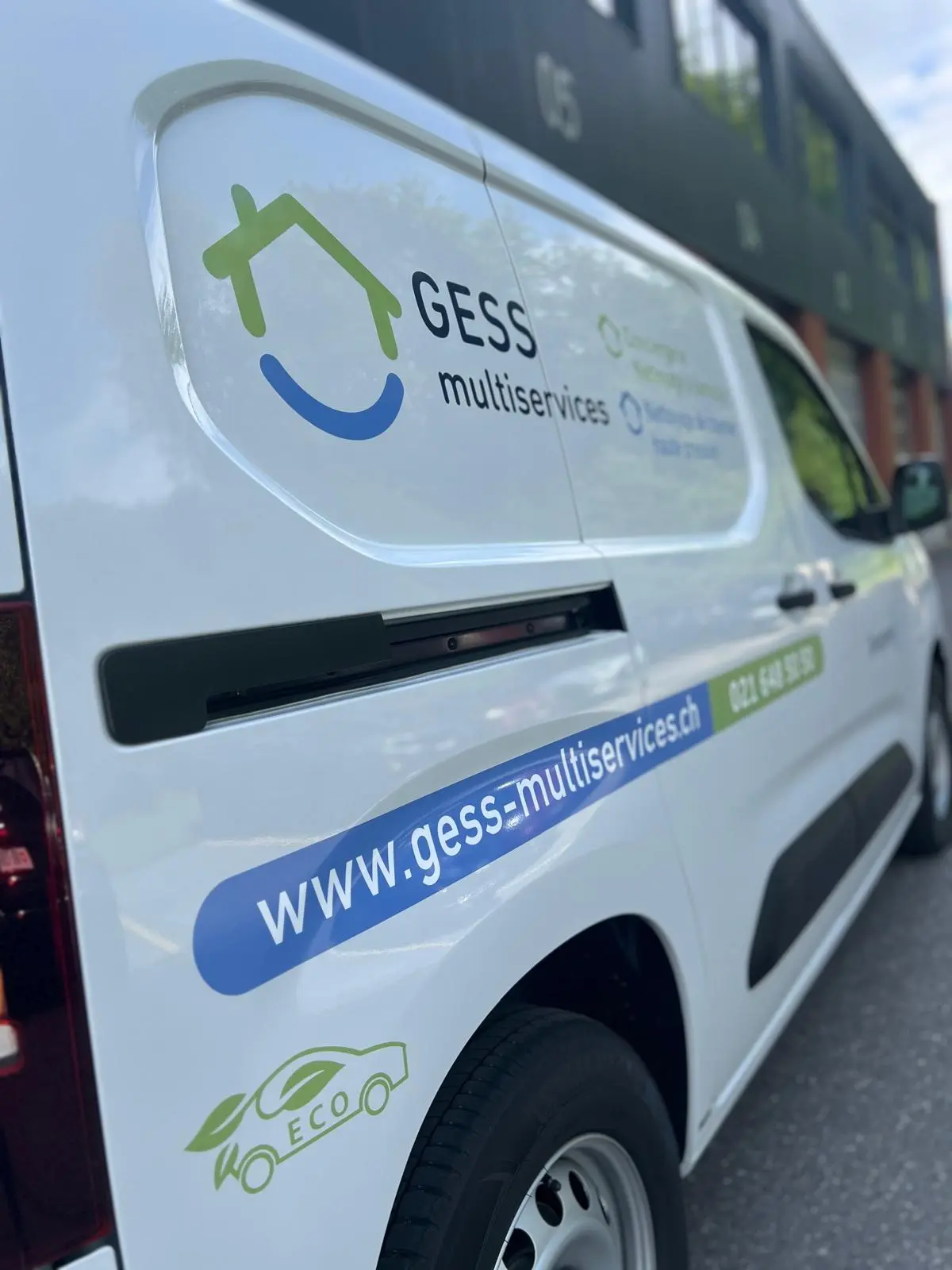 a white van with logos on it