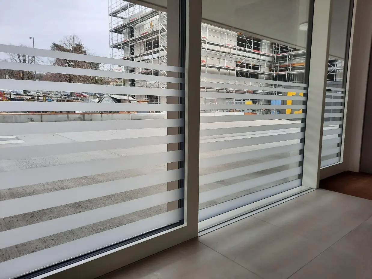 a window with blinds on it