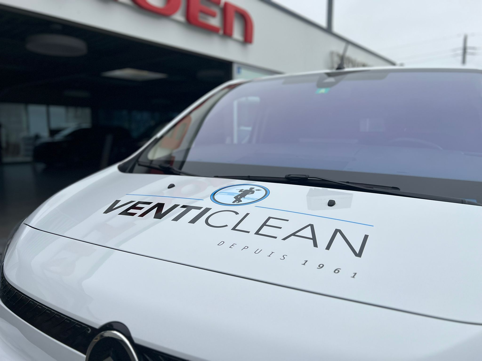 a car parked in front of a building