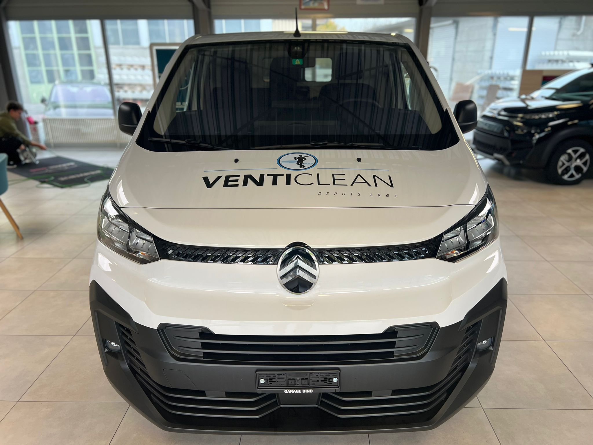 a white car in a building