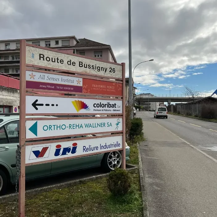 a sign on the side of a road